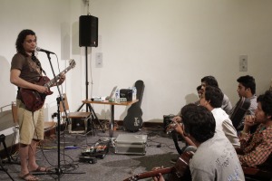 Musician Mekaal Hassan leads a guitar workshop at Music Mela.